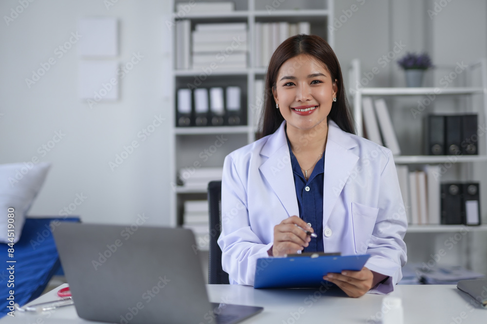 Smiling doctor holding a clipboard in a modern office, wearing a white coat, representing professional healthcare and medical consultation. Smiling doctor holding a clipboard in a modern office, wearing a white coat, representing professional healthcare and medical consultation.
