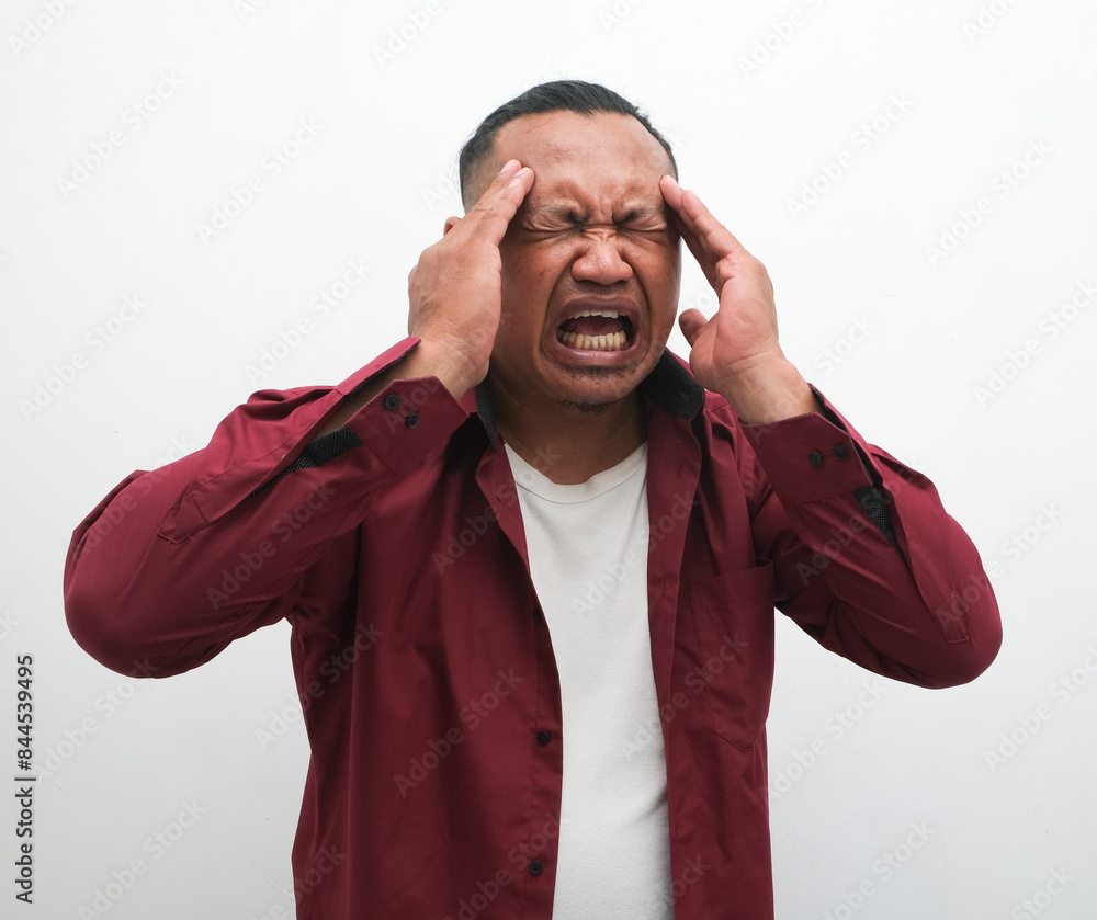 asian man feeling headache isolated on white background asian man feeling headache isolated on white background