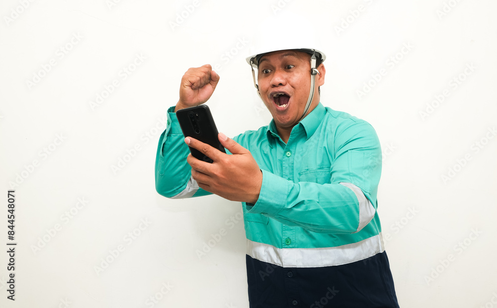 shocked expression of man looking at mobile phone screen isolated on white background