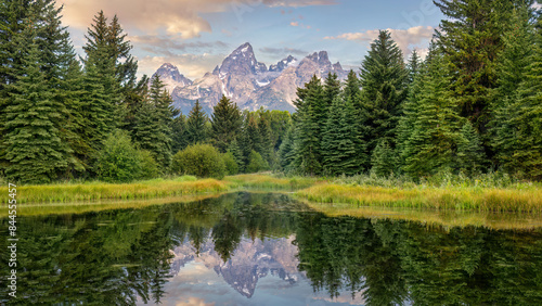 Morning light on the mountains at Grand Teton National Park - Snake River at Schwabacher landing photo