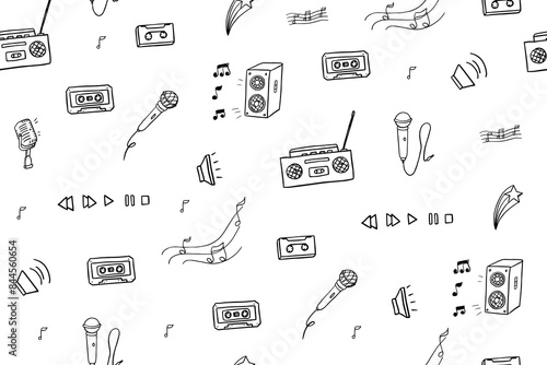 Seamless pattern of music theme in doodle style. Сassette, tape recorder, microphone, sheet music, music column. Hand drawn