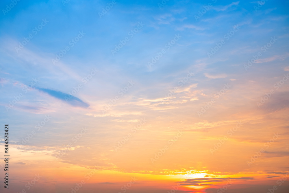 Beautiful , luxury soft gradient orange gold clouds and sunlight on the blue sky perfect for the background, take in everning,Twilight, Large size, high definition landscape photo Beautiful , luxury soft gradient orange gold clouds and sunlight on the blue sky perfect for the background, take in everning,Twilight, Large size, high definition landscape photo