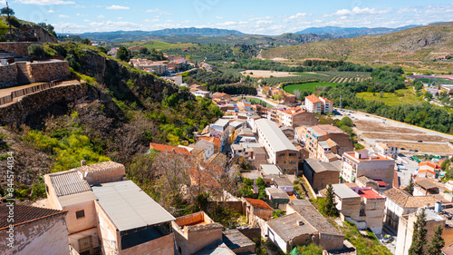 Aerial photo from drone to city of Loja and Church of the Incarnation with Moorish Alcazaba and Gorda Peak .Loja ,Granada, Andalusia, Spain, Europe (Series)
