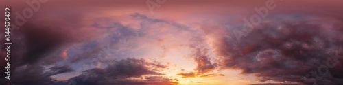 Dramatic Sunset sky 360 panorama. Vibrant sky panorama with bright glowing red pink Cumulus clouds. HDR 360 seamless spherical panorama. Sky dome for aerial drone panoramas. Climate and weather change