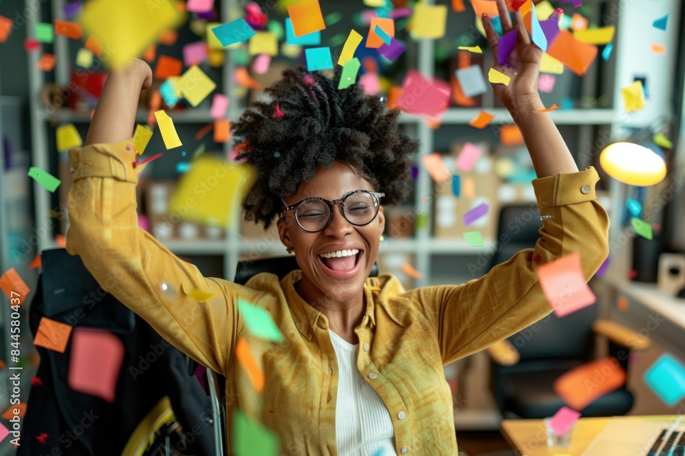 A joyful young woman throwing colorful confetti in the air in an office setting, portraying celebration and happiness A joyful young woman throwing colorful confetti in the air in an office setting, portraying celebration and happiness