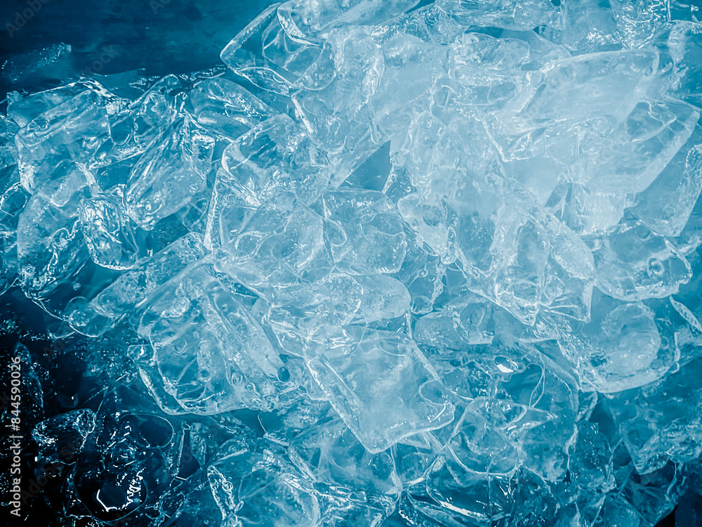 Obraz premium icecubes background,icecubes texture,icecubes wallpaper,ice helps to feel refreshed and cool water from the icecubes helps the water refresh your life and feel good.ice drinks for refreshment business