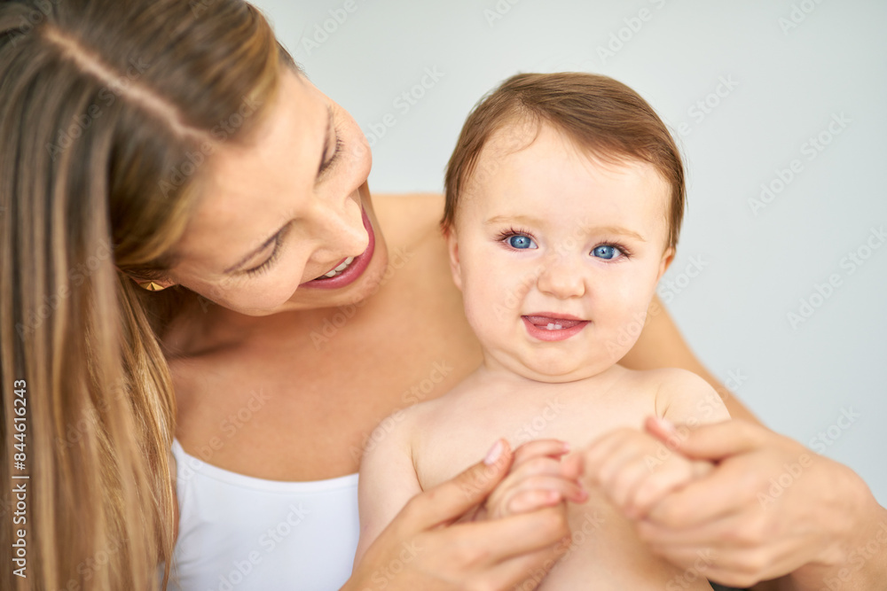 Bonding, portrait and mother holding baby at home for safety, love and protection. Happy, sweet and mom with cute toddler, kid or child for care and support together at family house in Australia. Bonding, portrait and mother holding baby at home for safety, love and protection. Happy, sweet and mom with cute toddler, kid or child for care and support together at family house in Australia.