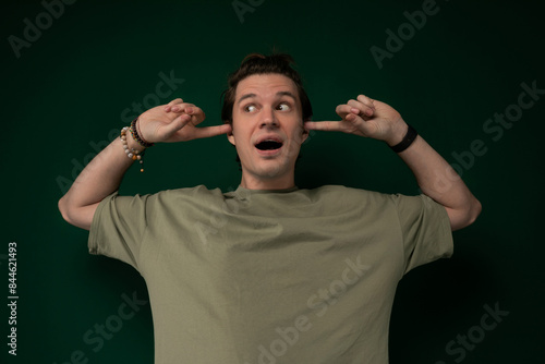 Man Making a Funny Face With His Hands photo