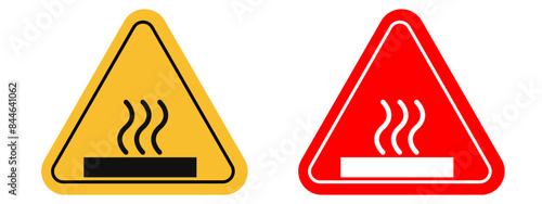 Warning about hot surface ahead indicating risk of burn injuries present