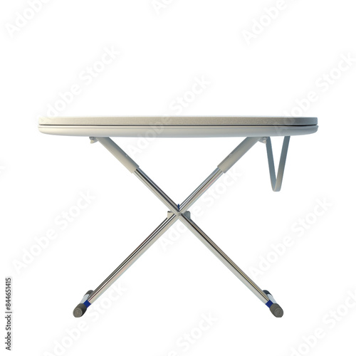 A silver ironing board with a white surface and blue feet stands isolated on a black background.