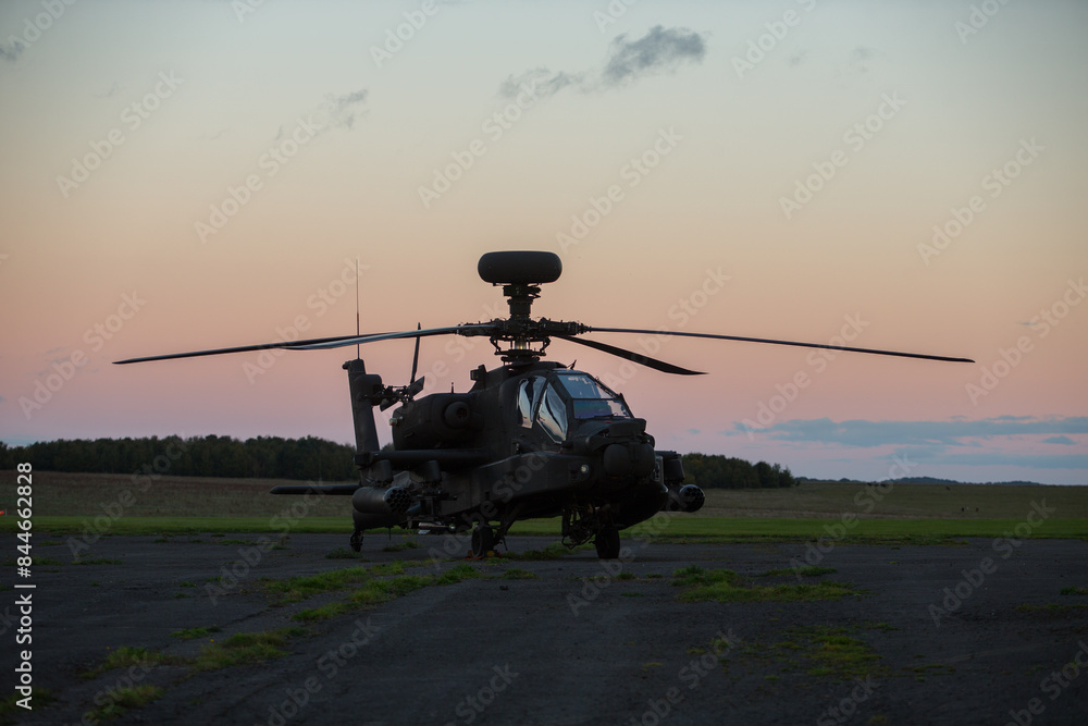 apache attack helicopter sunset stationary apache attack helicopter sunset stationary