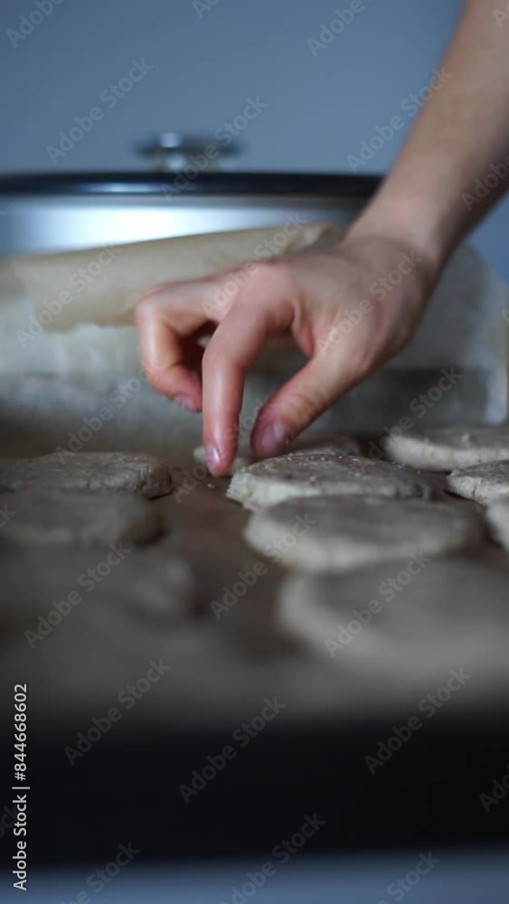 Makes cookies from dough vertical video Makes cookies from dough vertical video
