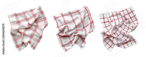 Kitchen towels, three red and white checkered cloths, crumpled and isolated on a transparent background.