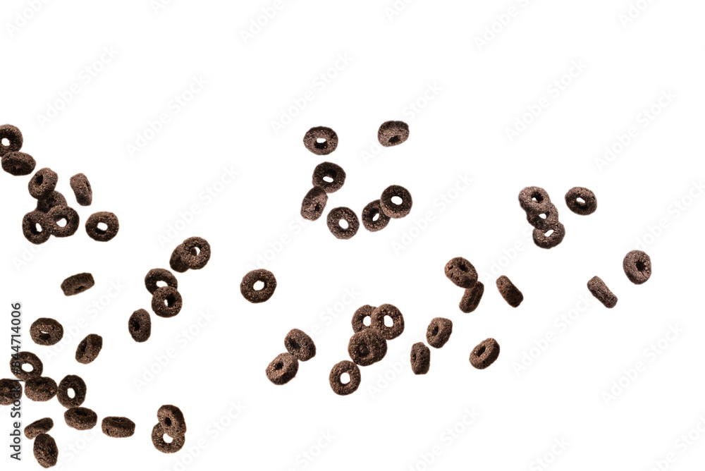 Chocolate rings cereal spill out into a bowl. Breakfast. Chocolate rings cereal spill out into a bowl. Breakfast.