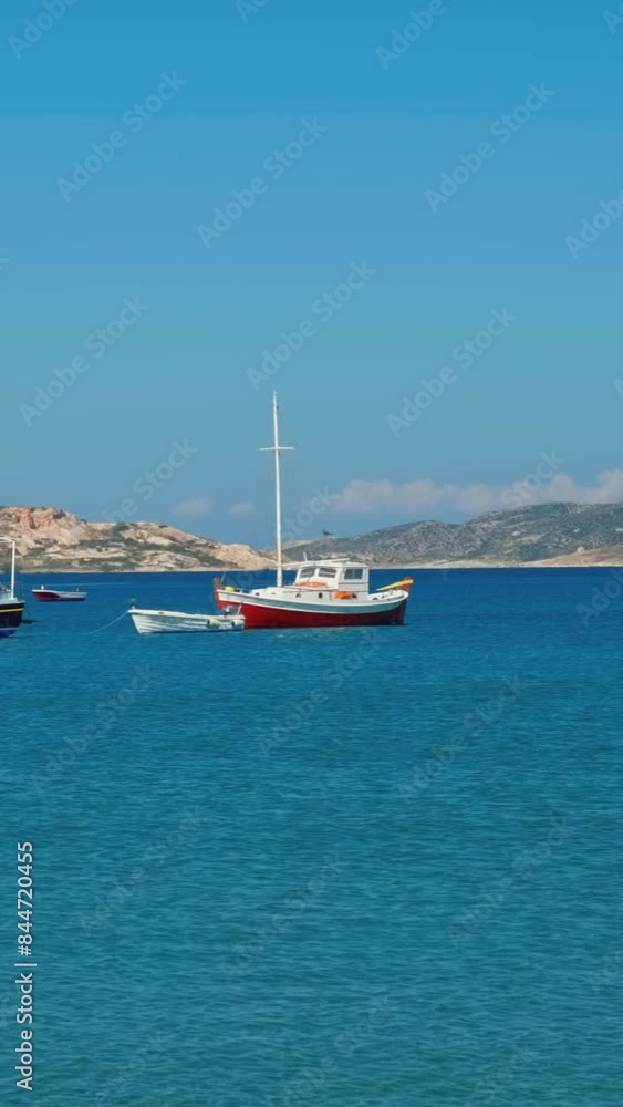 The beach and fishing village of Pollonia in Milos island, Greece. Horizontal camera pan The beach and fishing village of Pollonia in Milos island, Greece. Horizontal camera pan