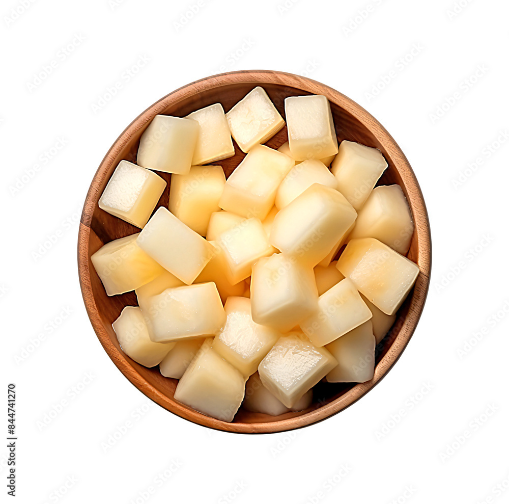 Melon cubes neatly arranged in a wooden bowl, showcasing their juicy texture and pale yellow color. Melon cubes neatly arranged in a wooden bowl, showcasing their juicy texture and pale yellow color.