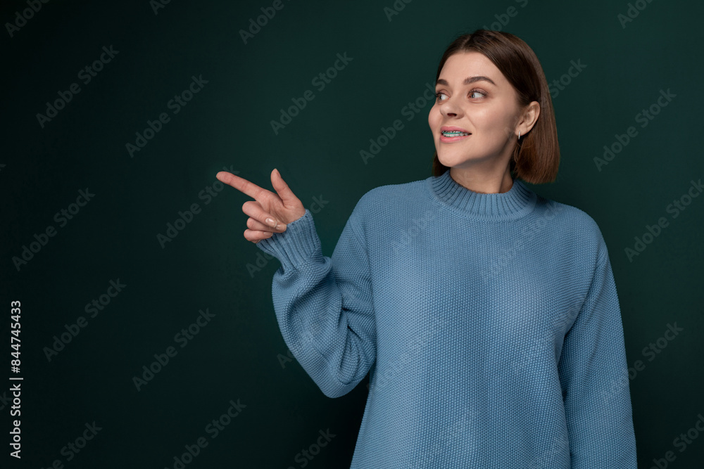 Woman Standing in Front of Green Wall Woman Standing in Front of Green Wall