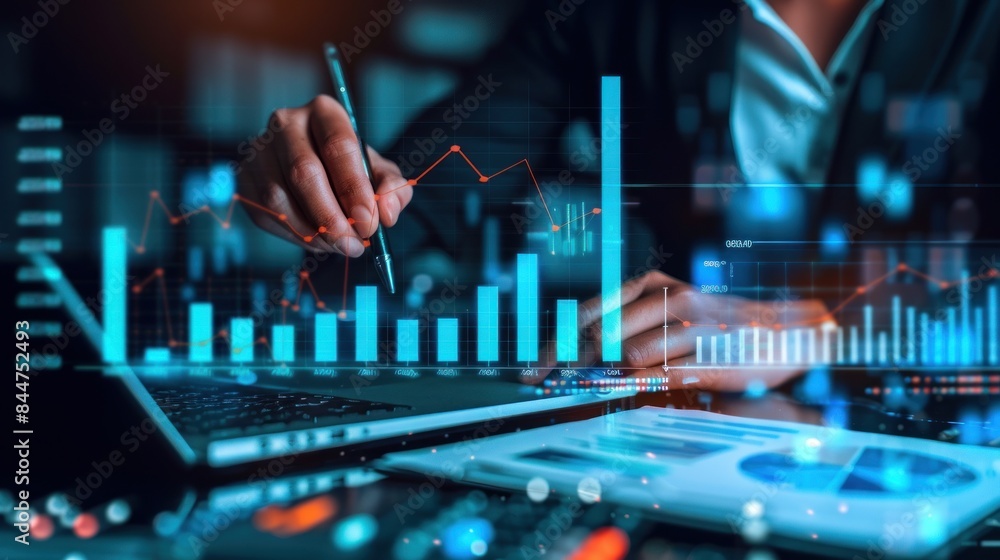 analysis working with the latest financial results. Analysis of sales forecast graphs, financial accounting with hand writing Abstract digital effect for background analysis working with the latest financial results. Analysis of sales forecast graphs, financial accounting with hand writing Abstract digital effect for background