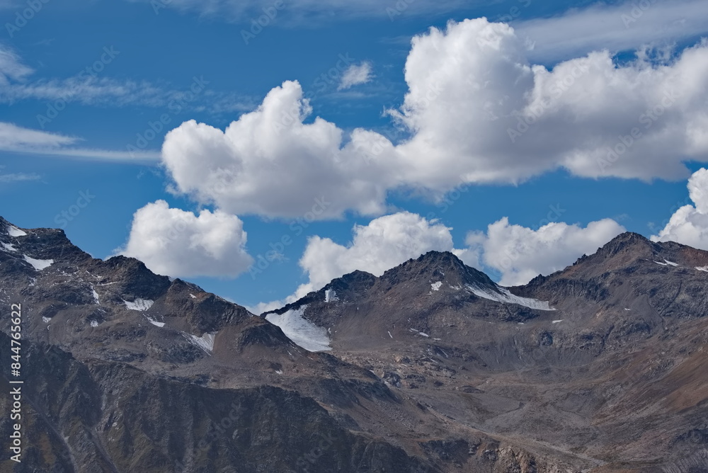 Russia. The North Caucasus. A stunning view of the peaks of the Caucasus Range from the snow-covered slope of Europe's highest mountain Elbrus. Russia. The North Caucasus. A stunning view of the peaks of the Caucasus Range from the snow-covered slope of Europe's highest mountain Elbrus.