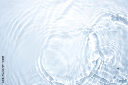 The surface of the water is clear, blue, soft and shiny.