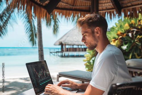 Stock market or forex trading graph and candlestick chart suitable for financial investment concept. A freelancer looks at a forex chart on a laptop screen at a resort © Irina