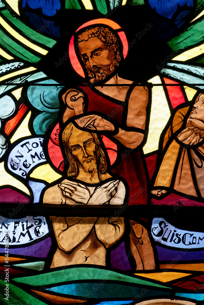 Stained glass representing the baptism of Christ. Vitrail représentant le bâptème du Christ. Annecy - France Stained glass representing the baptism of Christ. Vitrail représentant le bâptème du Christ. Annecy - France
