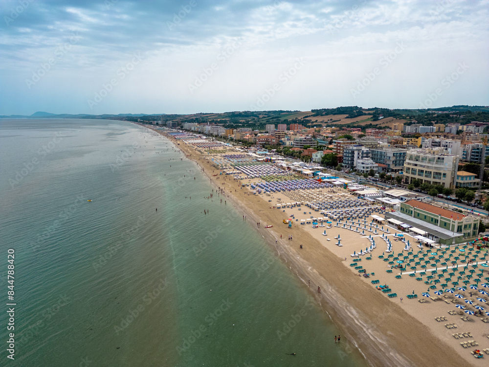 Fototapeta premium Italy, 09 June 2024: panoramic aerial view of the sea and the velvet beach of Senigallia in the province of Ancona Marche