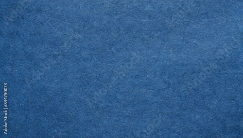 Dusty, grainy, rough, earthy handmade blue paper texture with visible fibers, for minimalistic art or backgrounds.