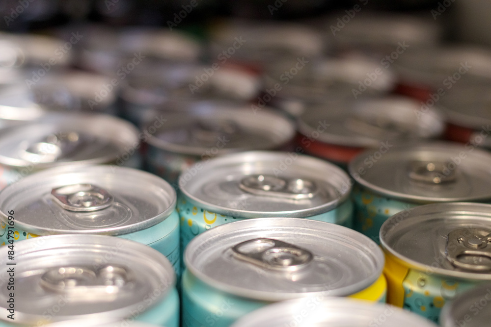 metal beer or juice cans on store shelves
metal beer or juice cans on store shelves