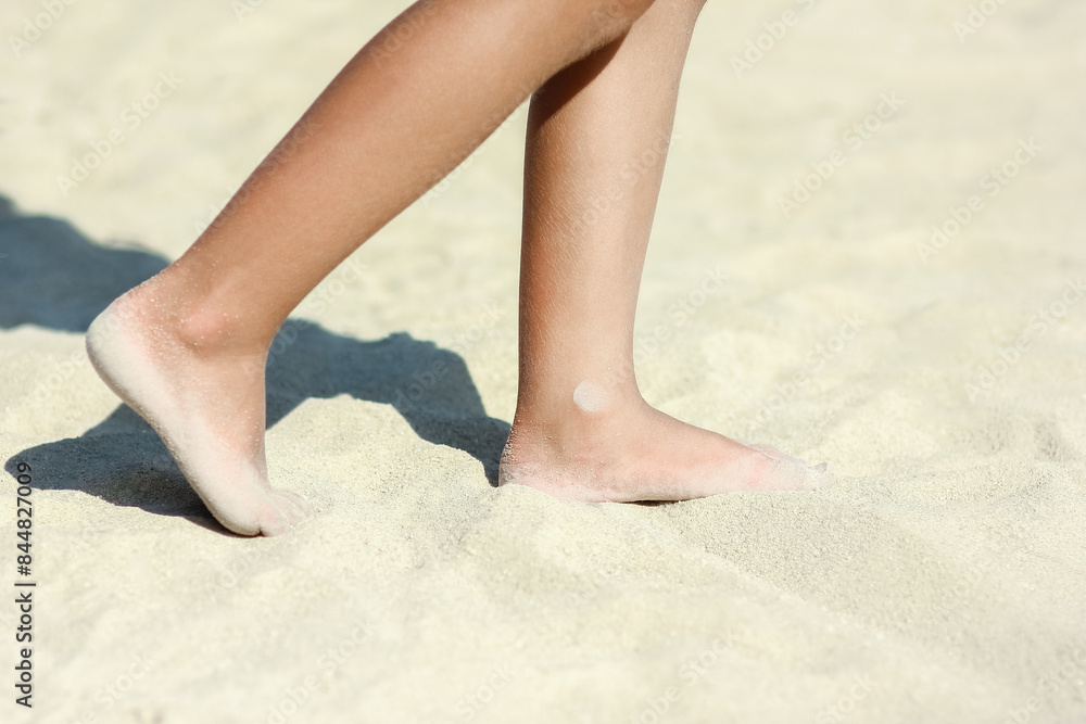 A Feet and footprints by the seashore in nature travel vacation background A Feet and footprints by the seashore in nature travel vacation background