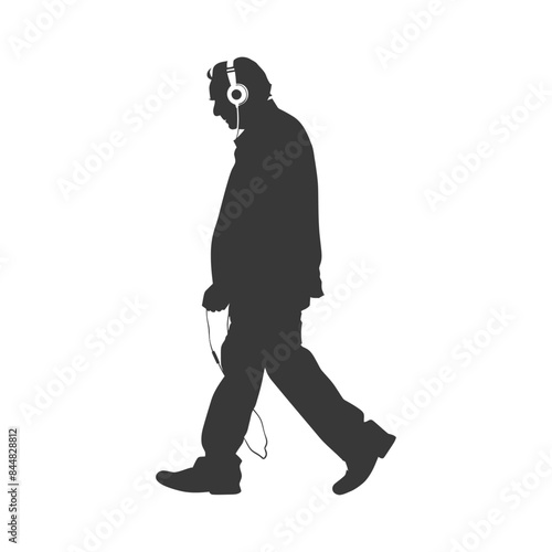Silhouette of a Man Walking with Headphones: Abstract Urban Commute.