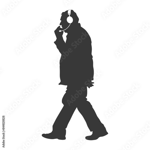 Silhouette of Man Walking, Headset and Microphone, Talking on the Phone.