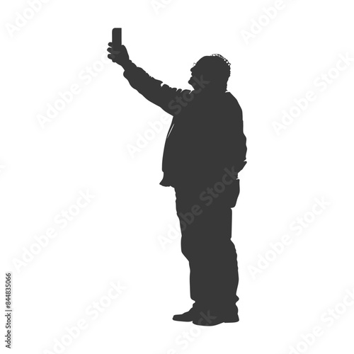 Silhouetted Man Taking a Selfie: Full Body, Elevated Phone, Side Profile.