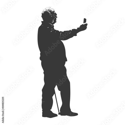 Elderly man silhouette: phone selfie with cane.