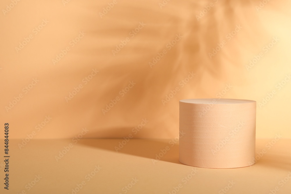 Presentation of product. Podium and shadows on orange background. Space for text Presentation of product. Podium and shadows on orange background. Space for text