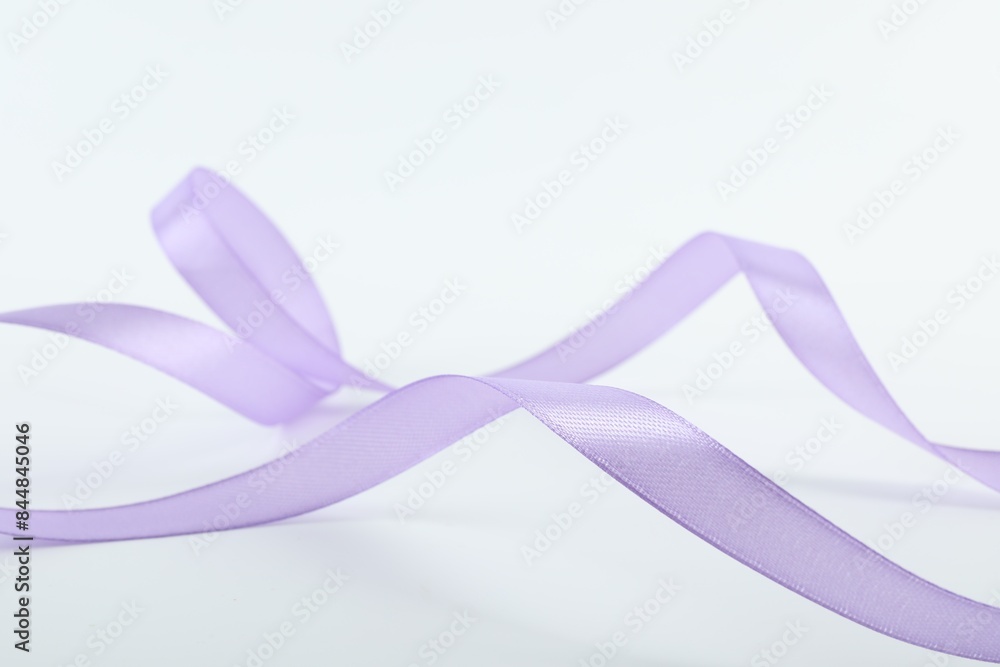 One beautiful violet ribbon isolated on white One beautiful violet ribbon isolated on white