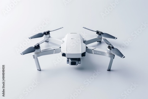 a white drone on a white surface photo