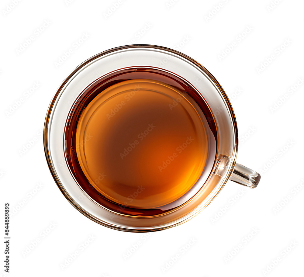 Tea in a clear glass cup seen from above. Tea in a clear glass cup seen from above.