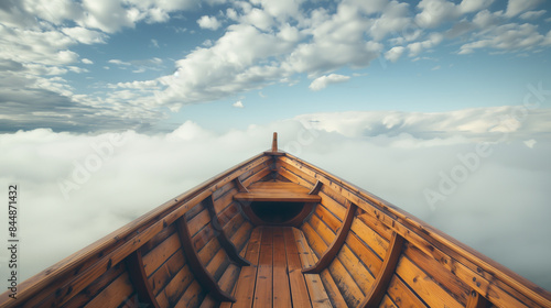 Visão em primeira pessoa de um barco de madeira navegando no céu azul com nuvens brancas photo