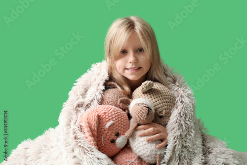 Cute little girl with plush...