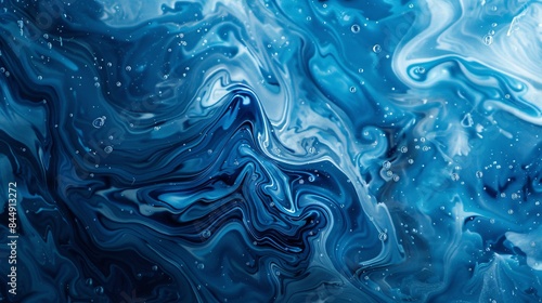The image is a blue and white swirl of water with many bubbles