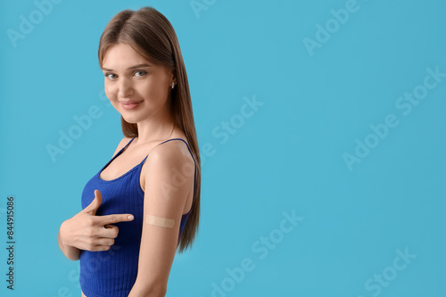 Pretty young woman pointing...