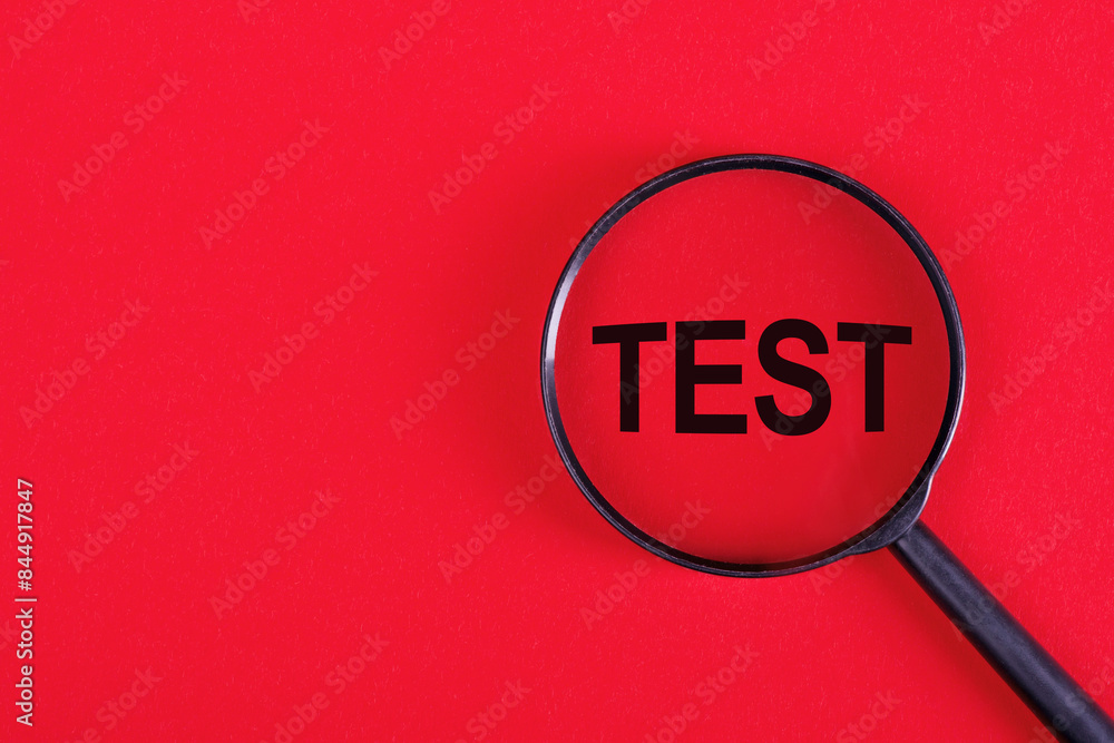 A close-up of a magnifying glass with the word test written on it, highlighting an examination or assessment concept. A close-up of a magnifying glass with the word test written on it, highlighting an examination or assessment concept.
