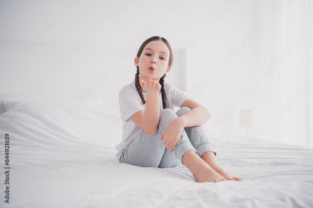 Portrait of charming nice lovely girl holiday morning send kiss white light bedroom interior indoors Portrait of charming nice lovely girl holiday morning send kiss white light bedroom interior indoors