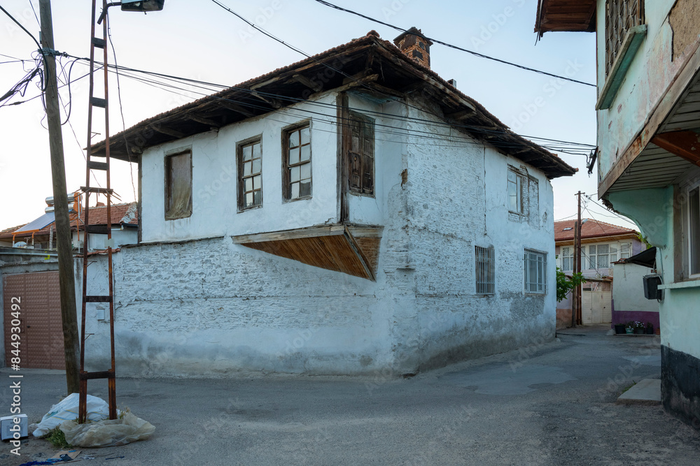Traditional Kula houses with wooden structure in Turkish and Ottoman architectural style, Manisa, Türkiye. Historical buildings and houses on the streets of Manisa. Traditional Kula houses with wooden structure in Turkish and Ottoman architectural style, Manisa, Türkiye. Historical buildings and houses on the streets of Manisa.