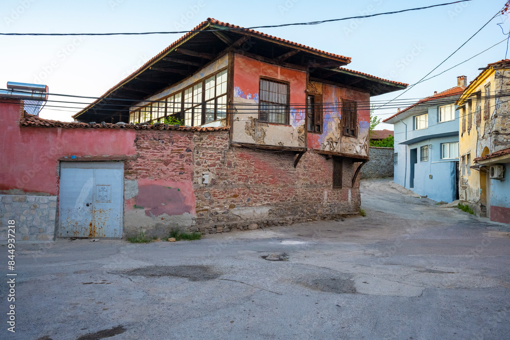 Traditional Kula houses with wooden structure in Turkish and Ottoman architectural style, Manisa, Türkiye. Historical buildings and houses on the streets of Manisa. Traditional Kula houses with wooden structure in Turkish and Ottoman architectural style, Manisa, Türkiye. Historical buildings and houses on the streets of Manisa.