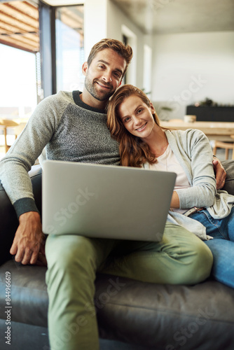 Portrait, smile and couple on laptop in home living room to relax, bonding or connection online together. Happy man, woman and computer on sofa for social media, news or streaming video on website