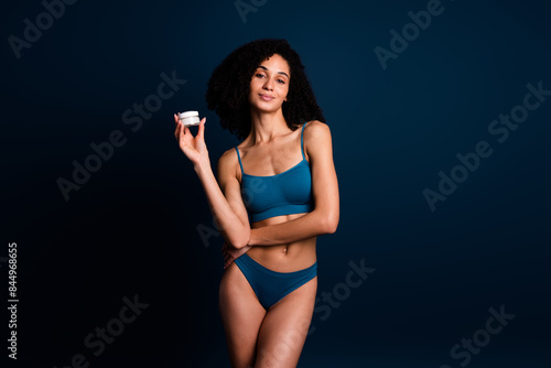 No filter photo of sweet shiny lady underwear lingerie rising skin mask empty space isolated blue color background