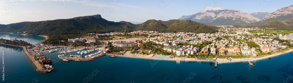 Fototapeta premium Panoramic photo of Kemer, resort town on Mediterranean coast of Turkey. City on Turkish Riviera from above.