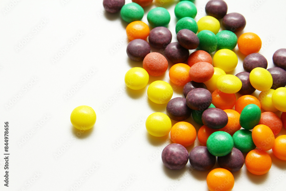 Close up shot of chewy colorful candy on white background Close up shot of chewy colorful candy on white background